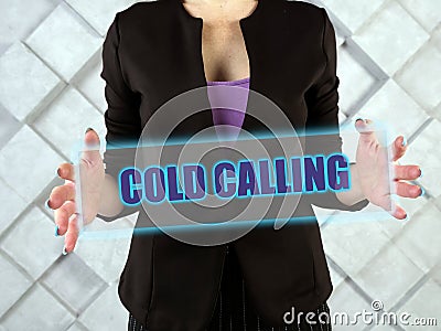 COLD CALLING inscription on the screen. Cold callingÂ typically refers to solicitation by phone or telemarketing Stock Photo